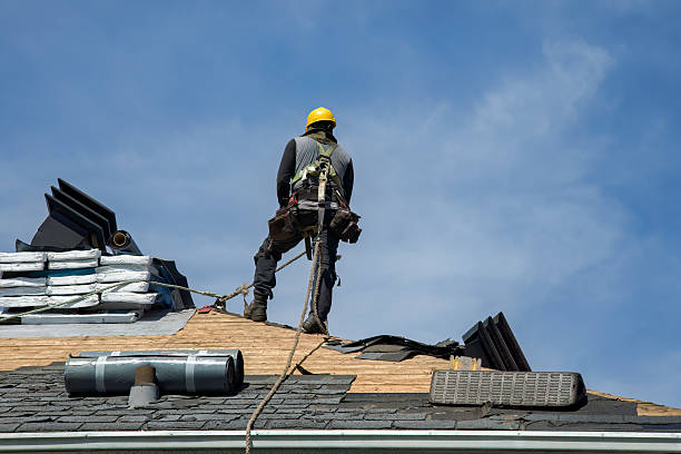 Professional Roof Replacement technician working in Newark Valley, NY